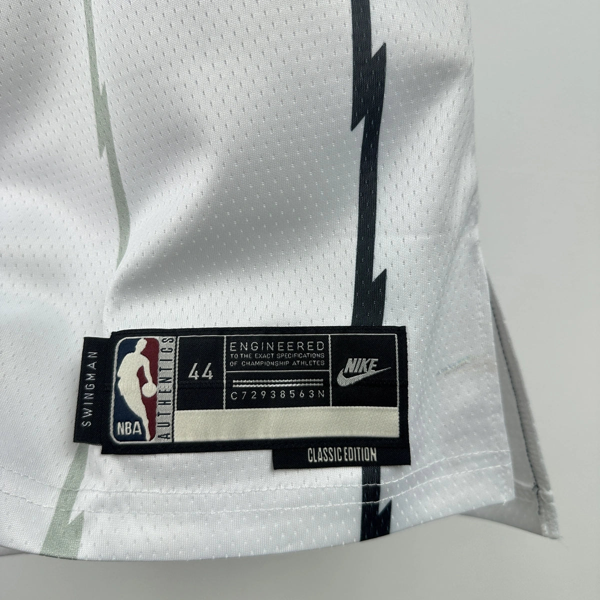 Toronto Raptors 2025-26 throwback edition basketball jersey additional angle view in white for basketball fans