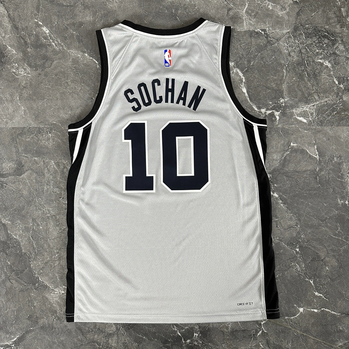 San Antonio Spurs 2025-26 limited edition basketball jersey angled back view in gray for basketball fans