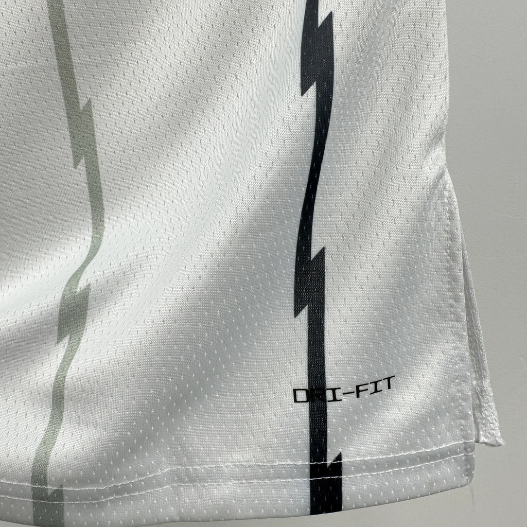 Toronto Raptors 2025-26 throwback edition basketball jersey close-up of moisture-wicking fabric texture in white for basketball fans