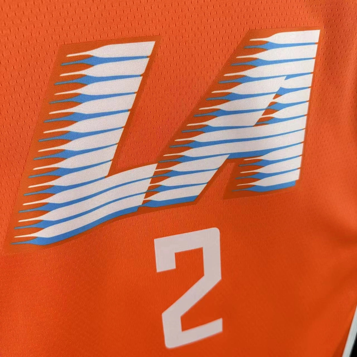 LA Clippers 2025-26 city edition basketball jersey close-up of jersey number and player name in team colors for basketball fans
