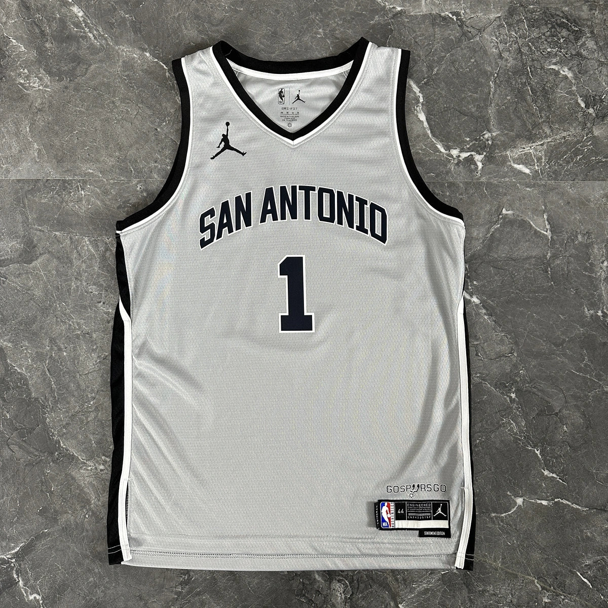 San Antonio Spurs 2025-26 limited edition basketball jersey angled back view in gray for basketball fans