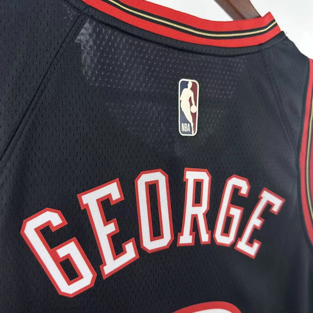 Philadelphia 76ers 2025-26 throwback edition basketball jersey close-up of collar and neckline stitching in black for basketball fans