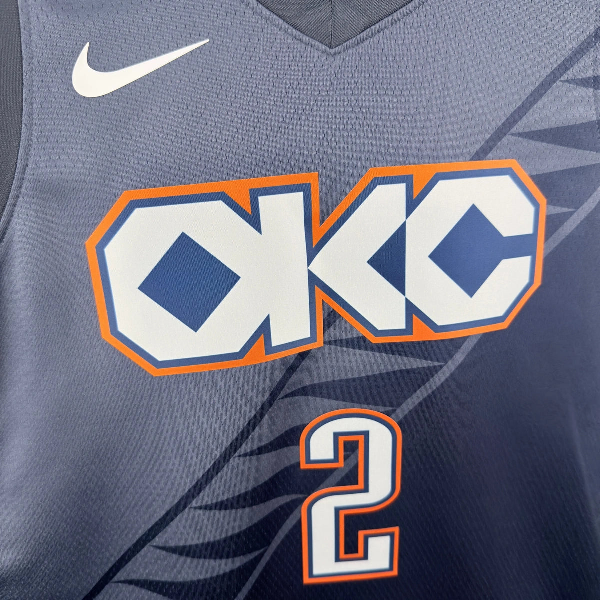Oklahoma City Thunder 2025-26 city edition basketball jersey close-up of collar and neckline stitching in team colors for basketball fans