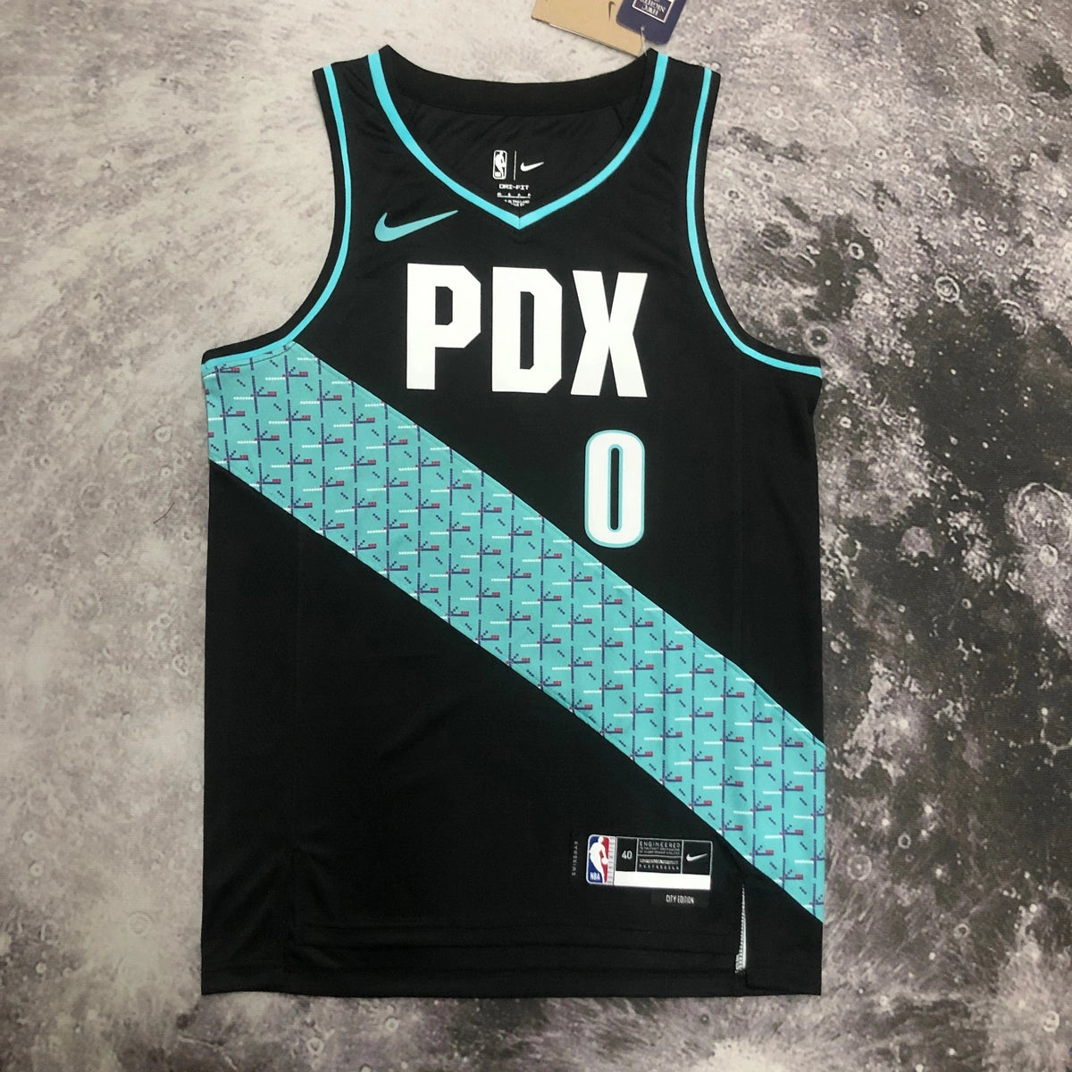 Portland Trail Blazers 2025-26 away basketball jersey angled front view in black for basketball fans