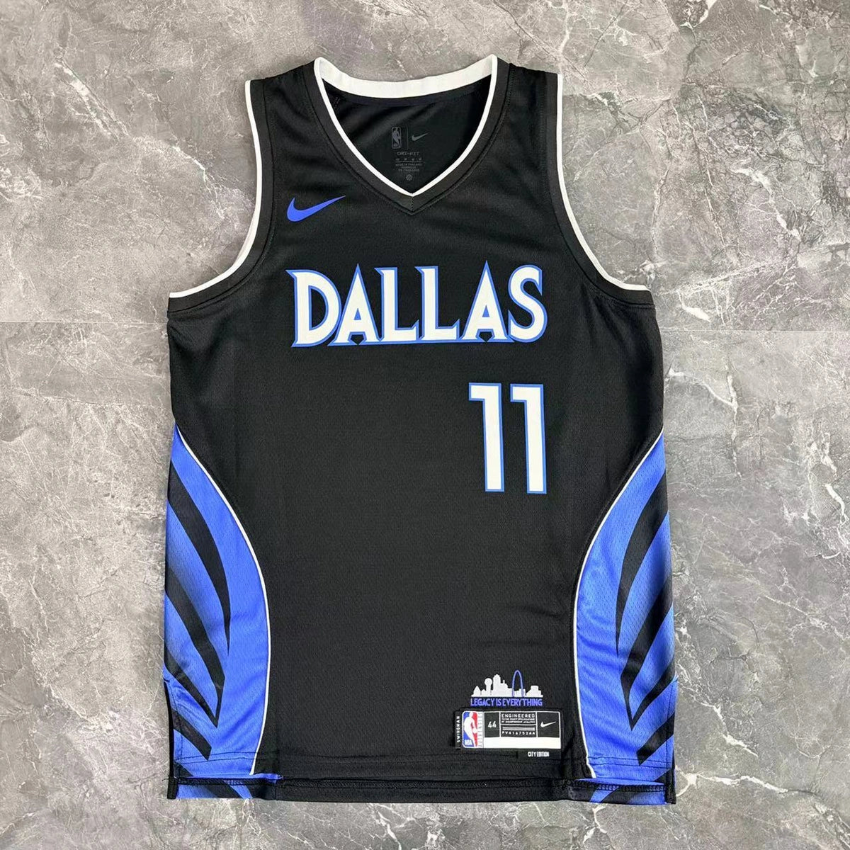 Dallas Mavericks 2025-26 throwback edition basketball jersey close-up of team logo embroidery in green for basketball fans