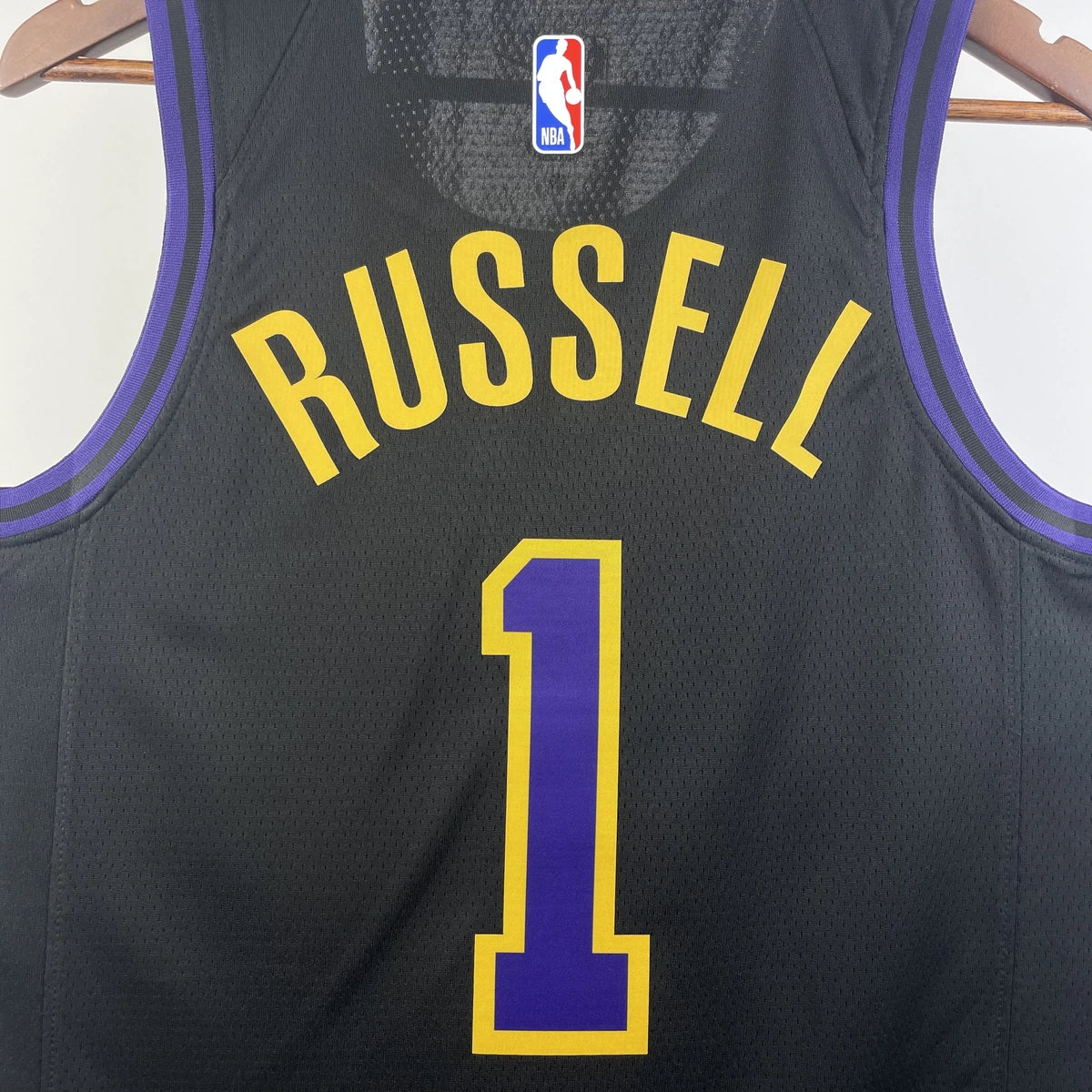 Los Angeles Lakers 2025-26 city edition basketball jersey angled back view in team colors for basketball fans