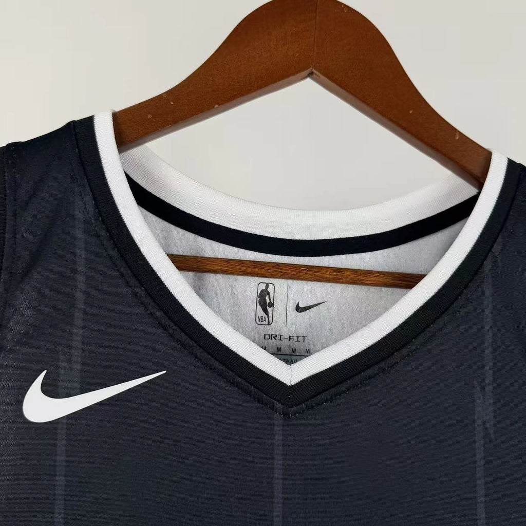 Toronto Raptors 2025-26 city edition basketball jersey close-up of collar and neckline stitching in team colors for basketball fans