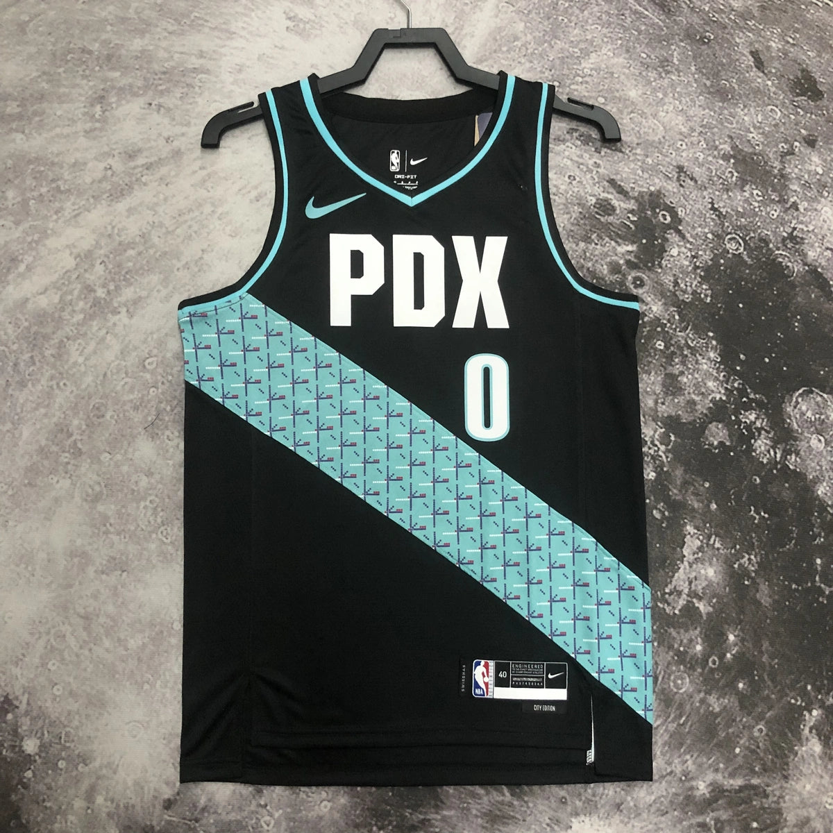 Portland Trail Blazers 2025-26 away basketball jersey side angle view in black for basketball fans