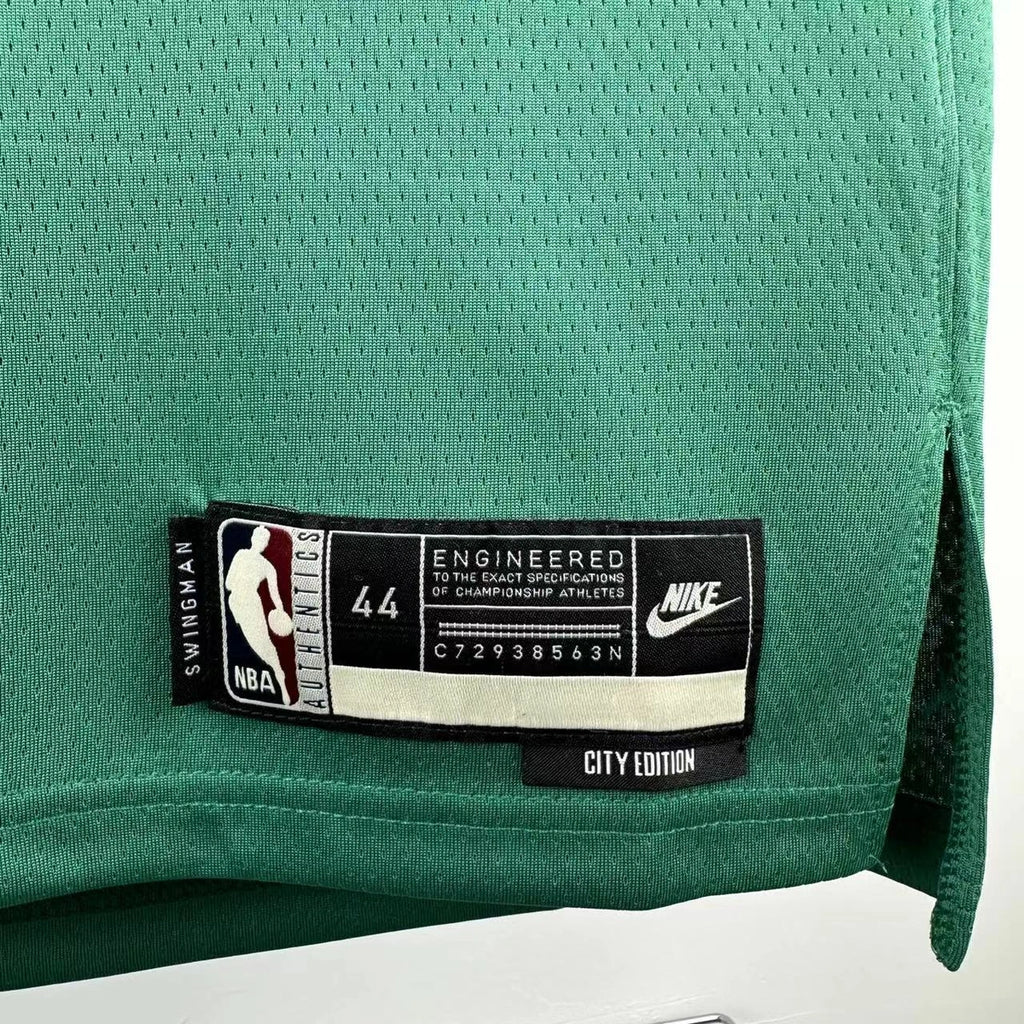 Dallas Mavericks 2025-26 throwback edition basketball jersey close-up of moisture-wicking fabric texture in green for basketball fans