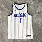 Orlando Magic 2025-26 away basketball jersey close-up of team logo embroidery in blue for basketball fans