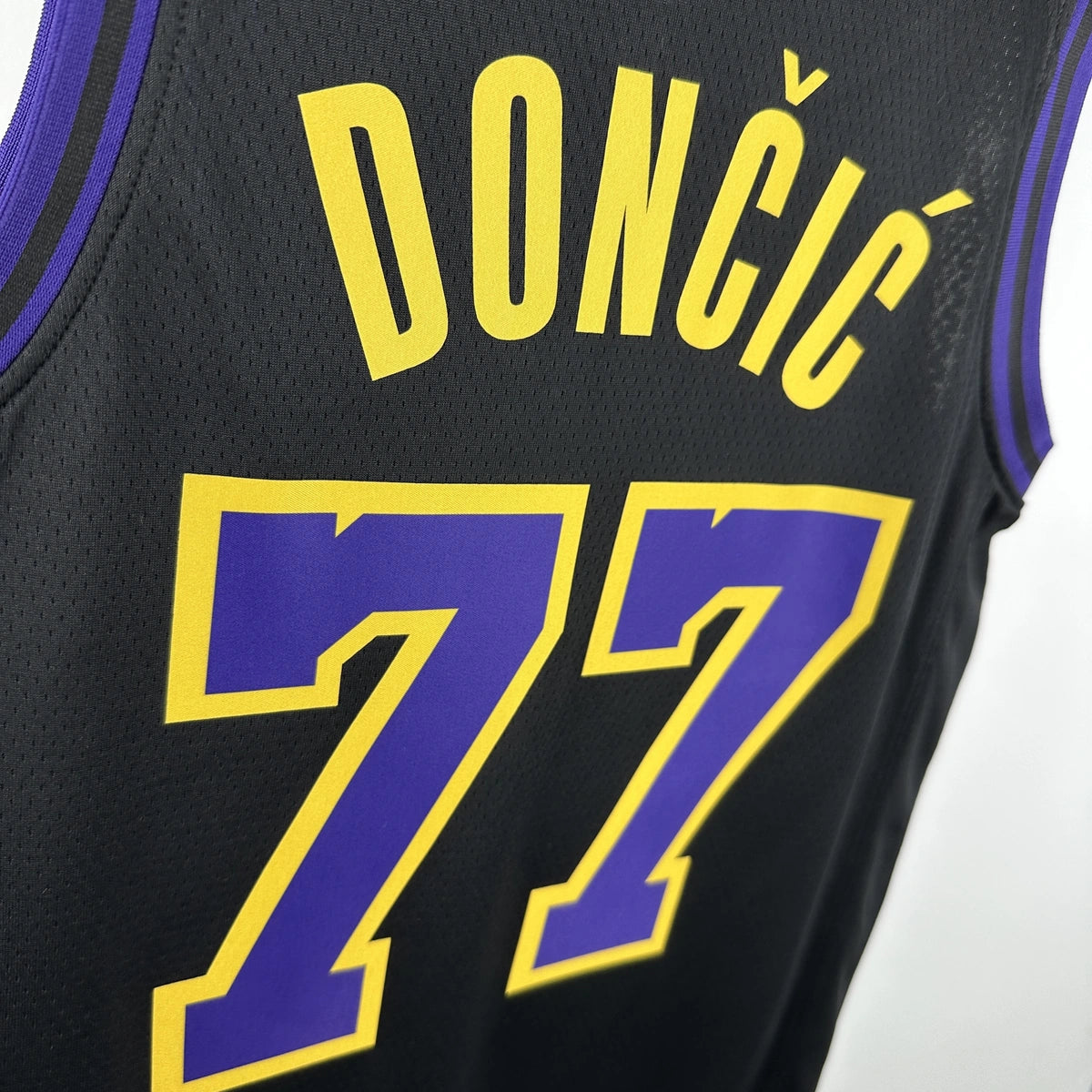 Los Angeles Lakers 2025-26 city edition basketball jersey angled back view in team colors for basketball fans