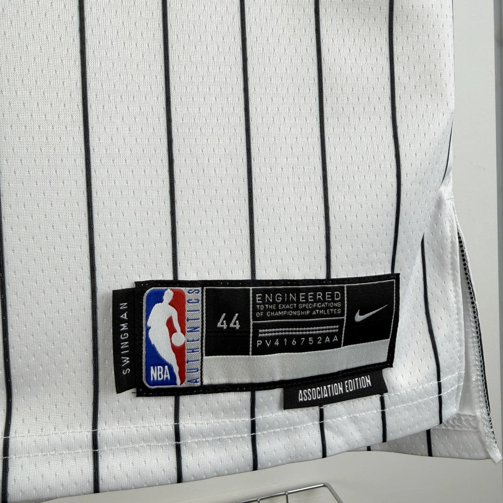 Orlando Magic 2025-26 home basketball jersey close-up of jersey number and player name in white for basketball fans