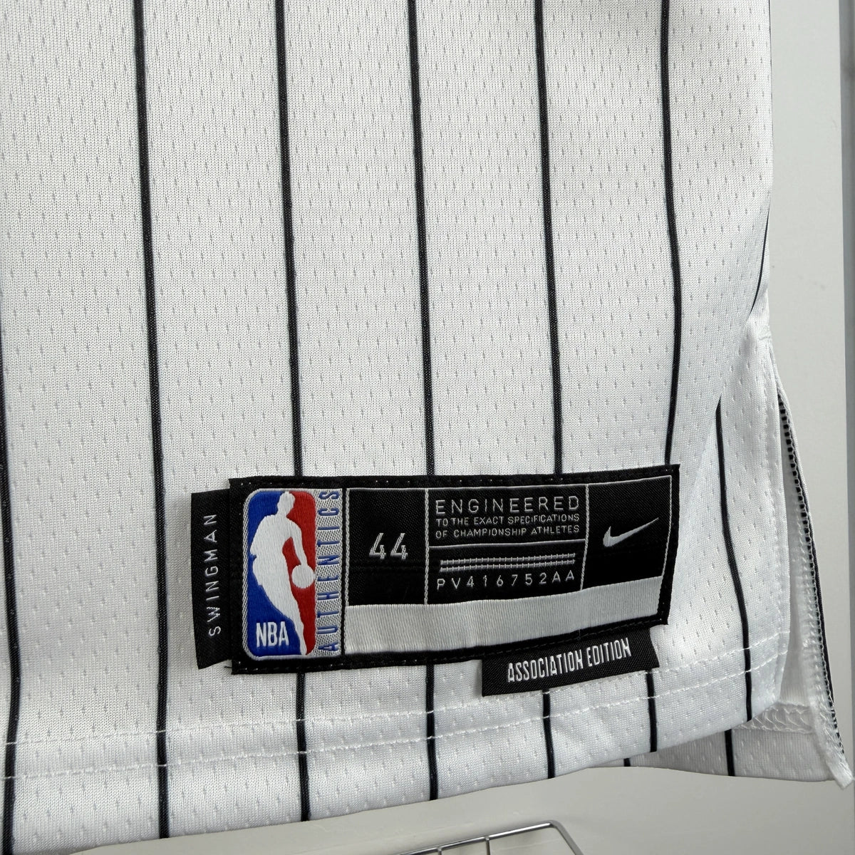 Orlando Magic 2025-26 home basketball jersey close-up of jersey number and player name in white for basketball fans