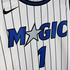 Orlando Magic 2025-26 away basketball jersey close-up of moisture-wicking fabric texture in blue for basketball fans