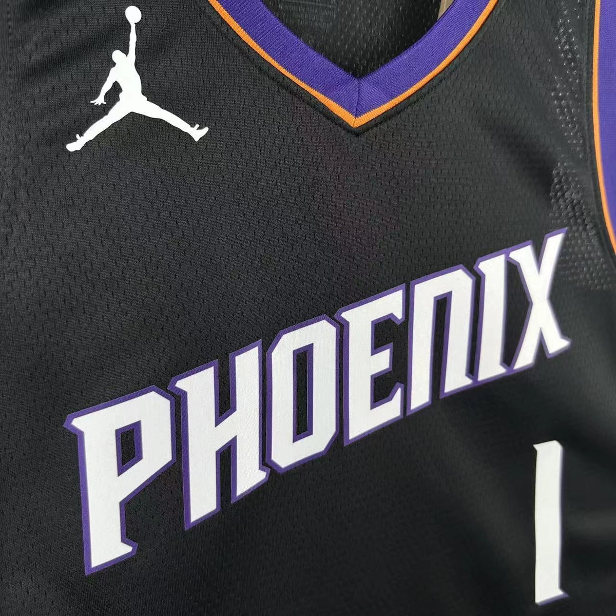 Phoenix Suns 2025-26 limited edition basketball jersey close-up of collar and neckline stitching in team colors for basketball fans