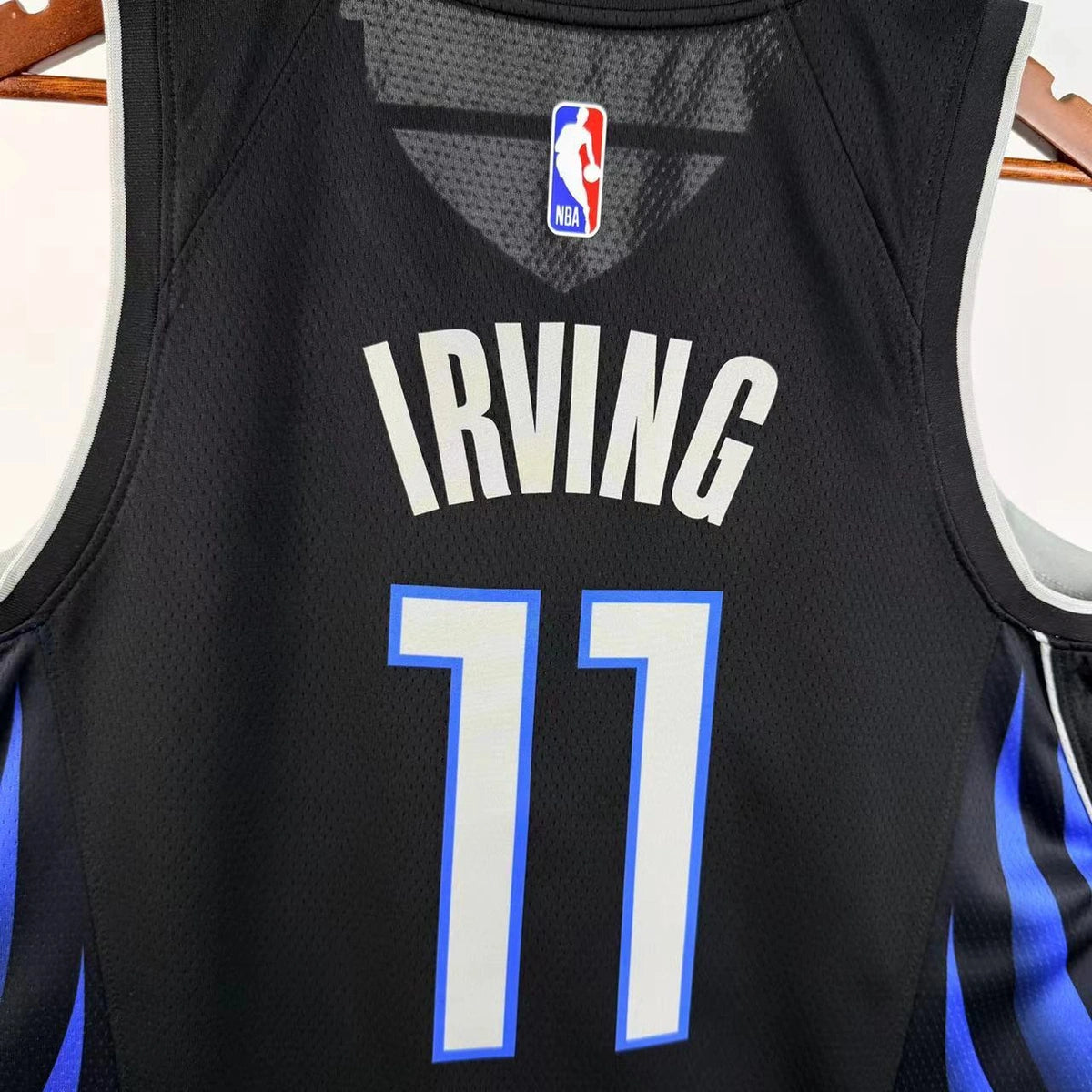 Dallas Mavericks 2025-26 throwback edition basketball jersey front flat lay view in green for basketball fans