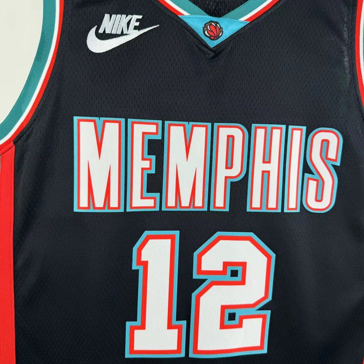Memphis Grizzlies 2025-26 throwback edition basketball jersey close-up of collar and neckline stitching in team colors for basketball fans