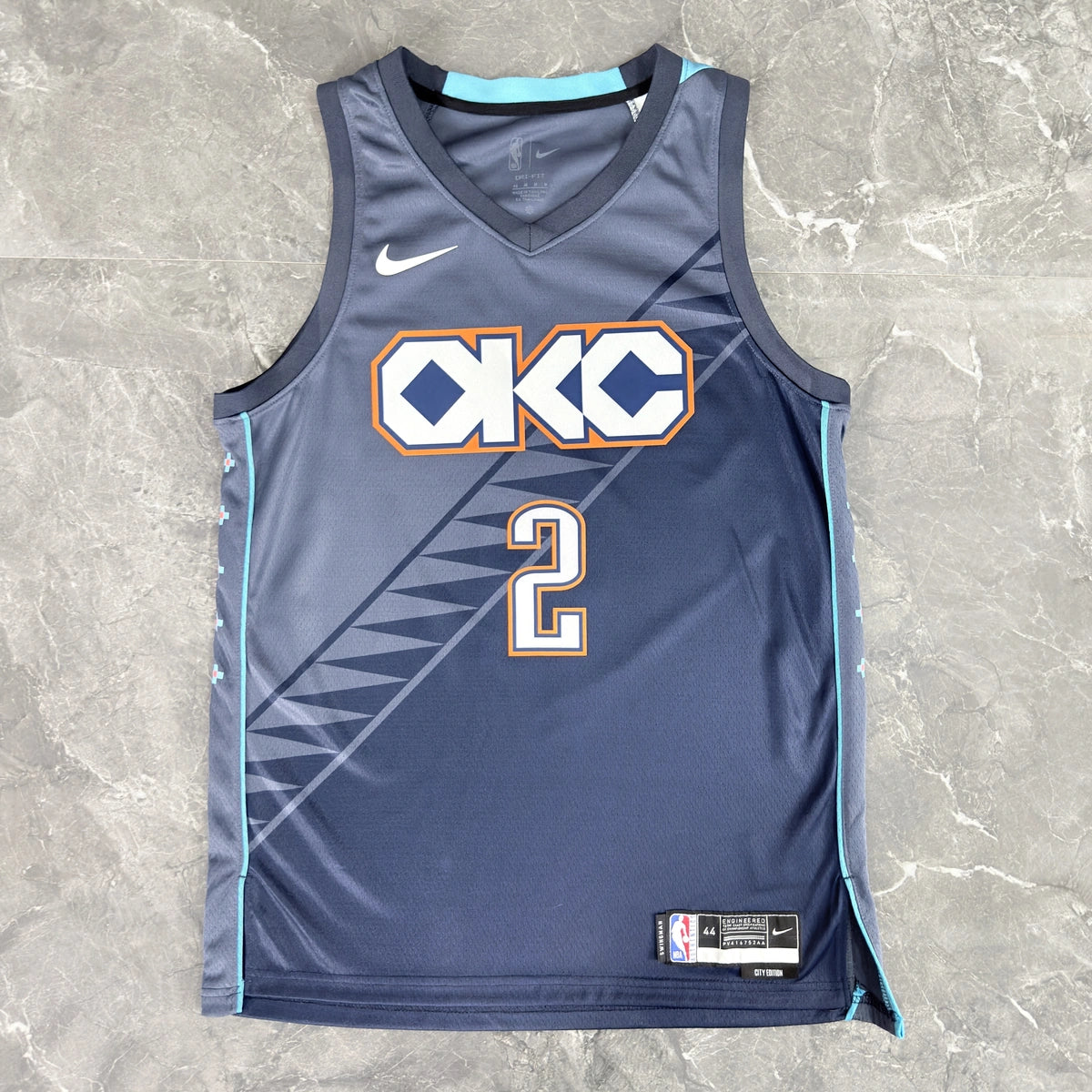 Oklahoma City Thunder 2025-26 city edition basketball jersey angled back view in team colors for basketball fans
