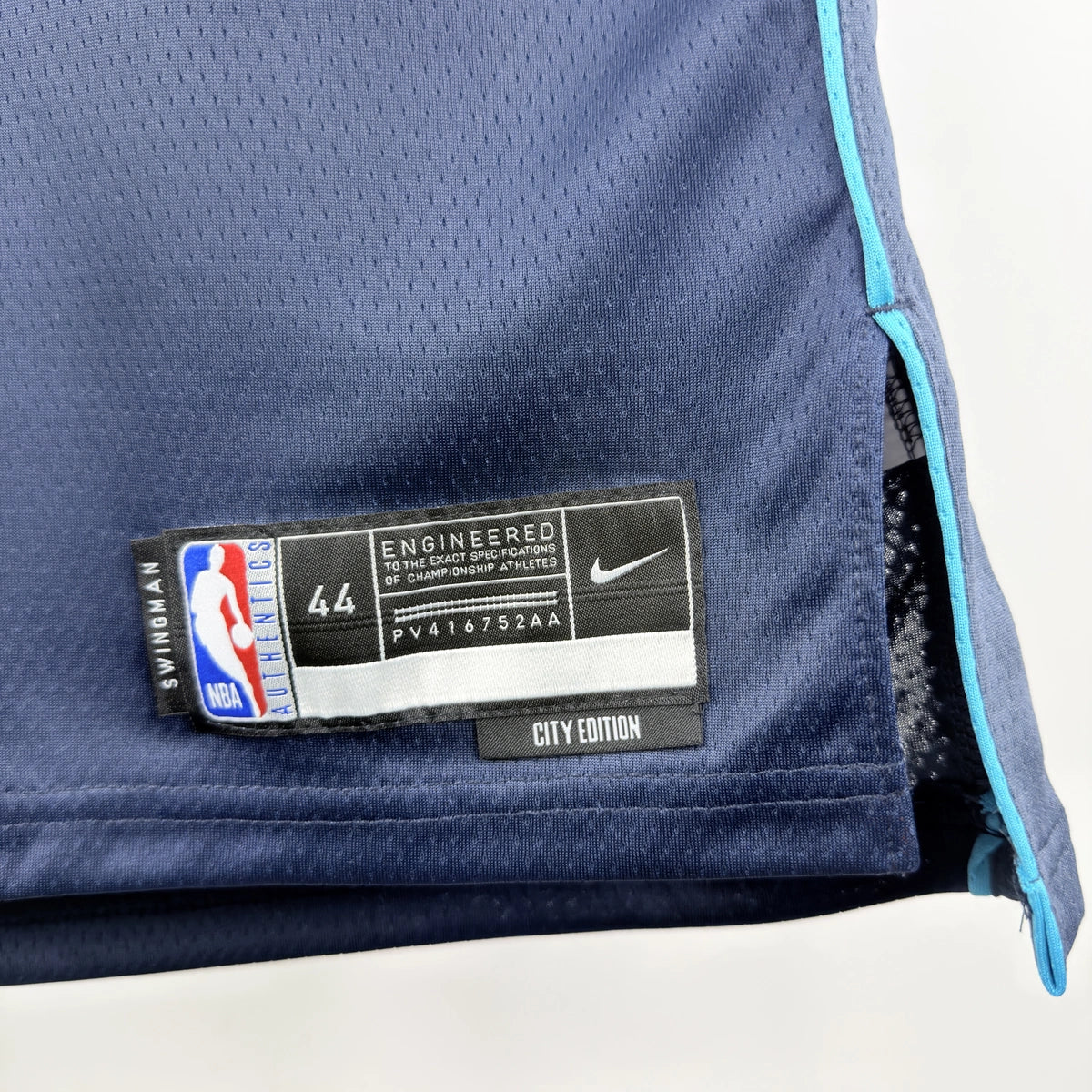 Oklahoma City Thunder 2025-26 city edition basketball jersey close-up of jock tag and hem details in team colors for basketball fans