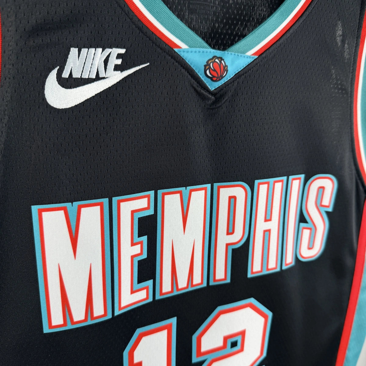 Memphis Grizzlies 2025-26 throwback edition basketball jersey front flat lay view in team colors for basketball fans
