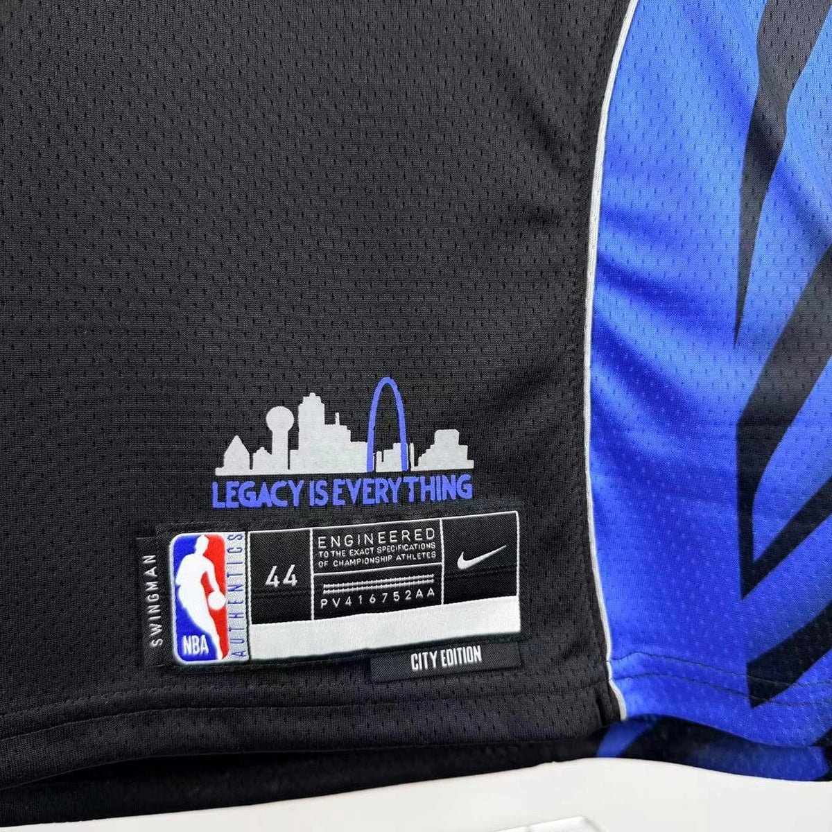 Dallas Mavericks 2025-26 throwback edition basketball jersey close-up of jersey number and player name in green for basketball fans