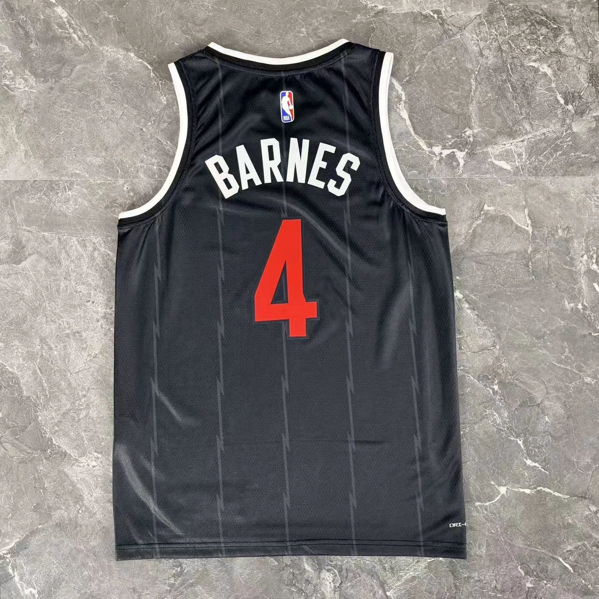 Toronto Raptors 2025-26 city edition basketball jersey close-up of team logo embroidery in team colors for basketball fans