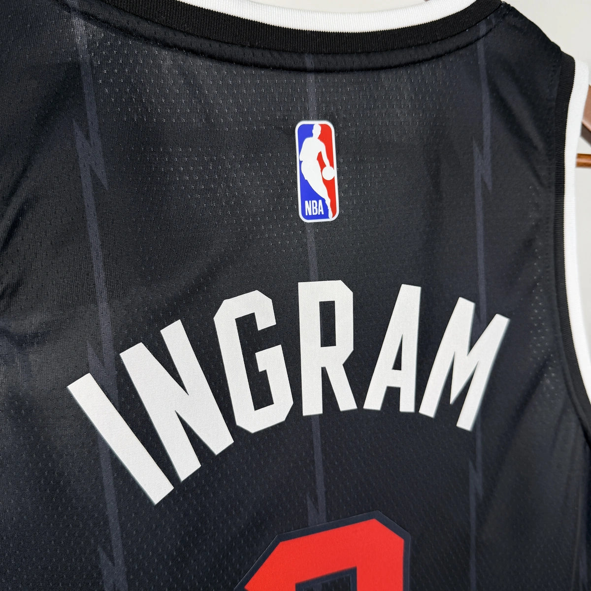 Toronto Raptors 2025-26 city edition basketball jersey side angle view in team colors for basketball fans