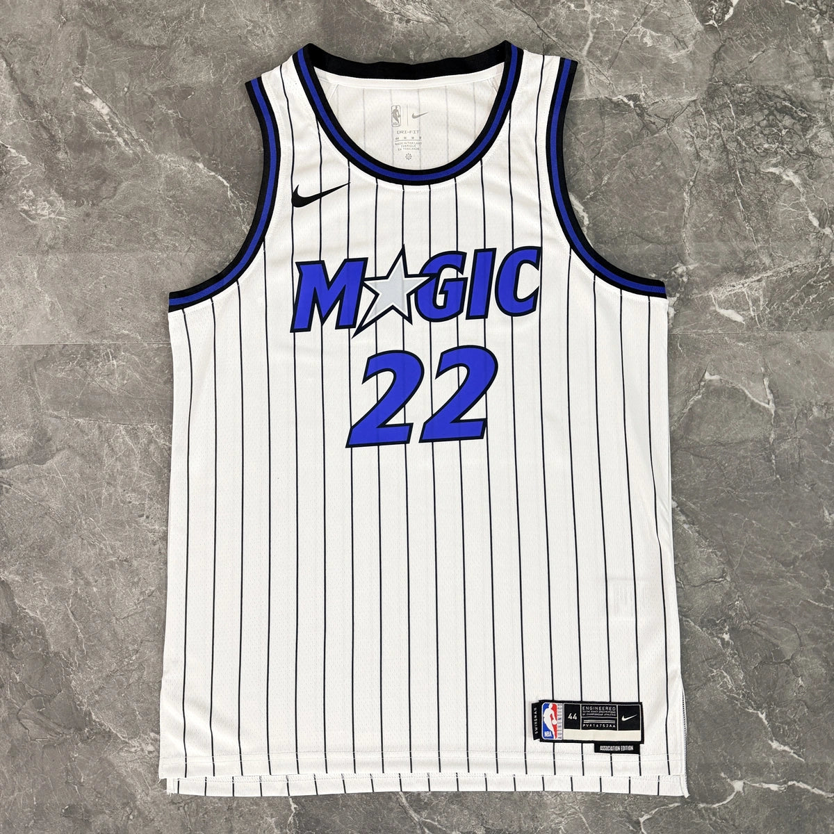 Orlando Magic 2025-26 home basketball jersey close-up of team logo embroidery in white for basketball fans